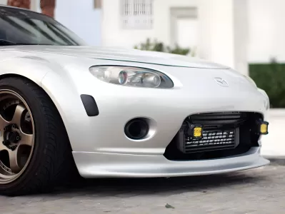 Depicted vehicle has additional modifications done to delete the factory grille and lower bumper. 2006 Mazda Miata MX5 PRO Design GV Style Front Lip