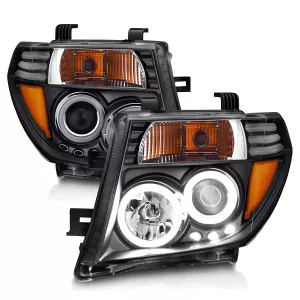 2006 Nissan Frontier CG Black Headlights