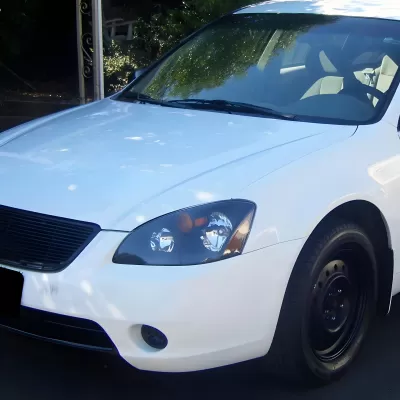 Nissan Altima - 2002 to 2004 - Sedan [All] (Factory OEM Style With Amber Reflector) (Not Compatible with OEM HID Lights)
