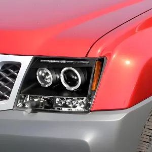 2010 Nissan Xterra PRO Design Black Headlights